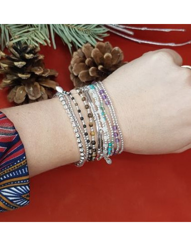 https://images3.mirage-bijoux.fr/721-large_default/bracelet-perles-argent-et-pierre-onyx-croix-argent-perle.jpg
